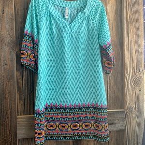 Never worn turquoise tunic dress with Aztec design